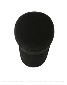 Top-down view of black wool flat cap for men with detailed knit texture for winter warmth