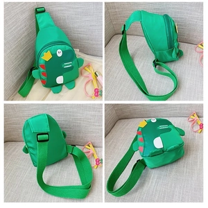 Detail view of green dinosaur kids chest bag showing front side back and bottom views