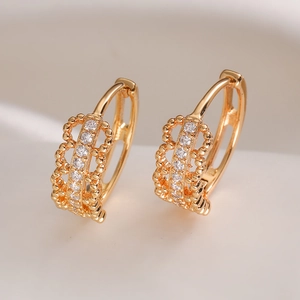 Orecchini a cerchio geometrici traforati placcati oro 18K con zirconi cubici trasparenti