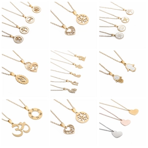 Variety of lotus and heart pendants in gold, silver, and rose gold stainless steel