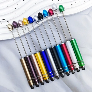Detailed array of 11 multi-color metal telescopic stylus pens with silicone touch tips