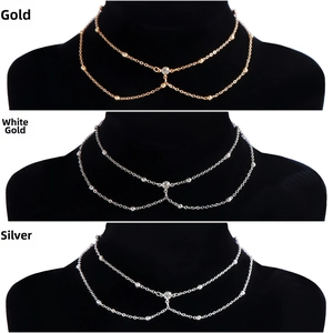 Detailed comparison of gold, white k, and silver double-layer body chains with rhinestones
