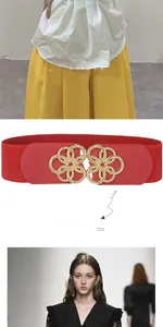 Detail of red elastic waist belt featuring a decorative golden hollow flower buckle