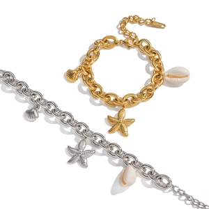 Ocean themed stainless steel charm bracelet with starfish and seashell pendants
