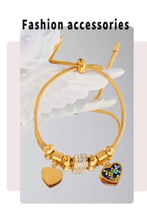Detail of adjustable 18K gold plated snake chain with heart charms and cubic zirconia