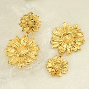 Golden sunflower drop earrings in titanium steel with textured hammer petal details