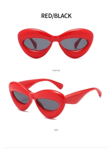 Front and side views of stylish red cat-eye sunglasses with dark black lenses