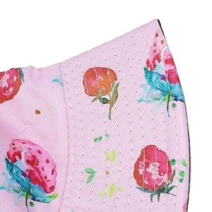 Detail of pink strawberry sun hat showing fabric texture and six-row stitching on the brim