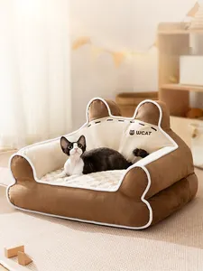 Detail view of plush warm pet sofa with cat ears and cozy non-slip cushion texture