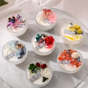 Set of 7 aromatherapy soy wax candles with dried flowers in ribbed glass jars with lids