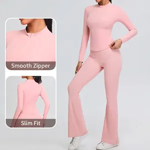 Pink half-zip long sleeve yoga top and flare leggings set with a slim fit sport design