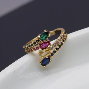 Adjustable gold serpent ring with colorful zircon gemstones and pavé crystals
