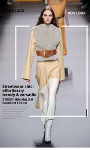 Detail of brown wide elastic waist belt with gold buckle styled on a wool vest and dress