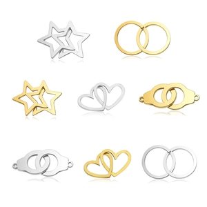 Detailed close-up of mixed gold and silver stainless steel jewelry interlocking connectors