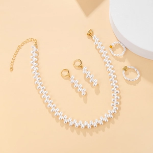 Elegant irregular pearl jewelry set including necklace, earrings and rings in gold finish