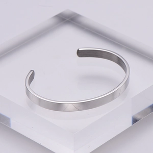 Minimalist 6mm stainless steel C-shaped open cuff bangle with a polished silver finish