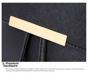 Close-up of golden metal plate on black Saffiano leather backpack with refined texture