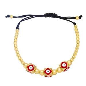 Detail of red square evil eye charms with zircons on adjustable beaded bracelet