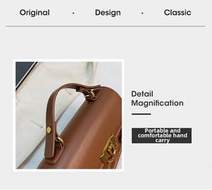 Detail of comfortable brown leather carry handle with golden rivets on a rhomboid bag