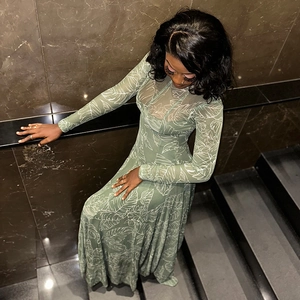 Vintage slim-fit floral maxi dress with white leaf print on green mesh fabric