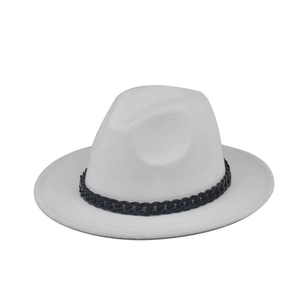 Detailed view of white wool fedora hat with decorative thick black chain embellishment