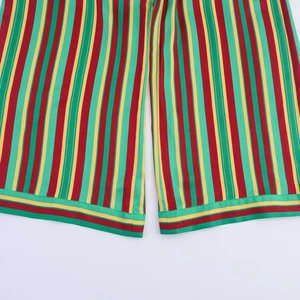 Vertical striped pants with red, green and yellow lines in a casual straight leg cut