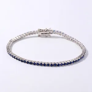 Silver-plated tennis bracelet with deep blue round zircons and secure buckle 18cm long