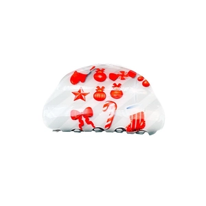 White PVC semi-circle hair claw clip with festive red Christmas patterns and motifs