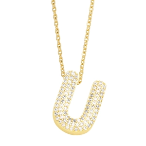 Macro view of gold letter U pendant with micro-paved white zircons on a link chain