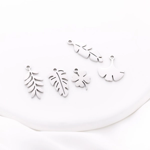 Collection of five silver stainless steel leaf and clover pendants for DIY jewelry making