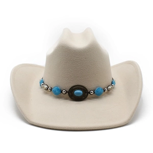 Detail of cream western cowboy hat with turquoise ethnic style decorative band