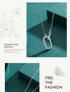 Close-up of S925 sterling silver geometric pendant with pavé cubic zirconia on chain