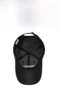Detail view of the black cotton baseball cap interior with stitching and wash label