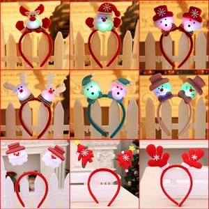 Set of nine festive LED Christmas headbands with reindeer, Santa, and snowman designs
