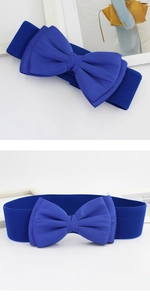 Detail of blue chiffon bow elastic waist belt with textured fabric and high stretch band