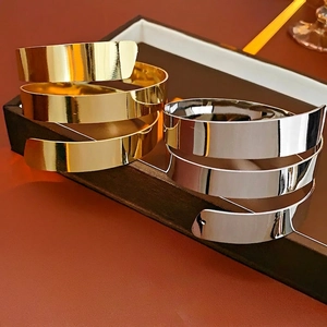 Minimalist multi-layer metallic cuff bracelets in polished gold and silver finish