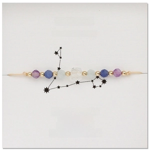 Detail van Vissen sterrenbeeld armband met natuurlijke amethist en aquamarijn stenen