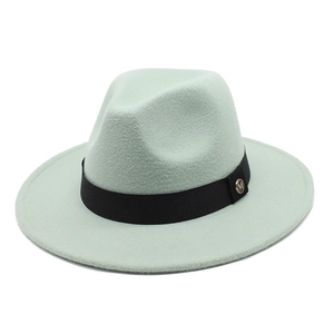 Close-up of mint green wool fedora hat featuring a black ribbon with a gold M logo buckle