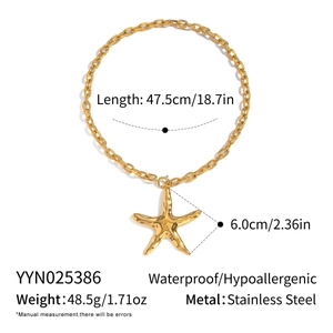 Macro view of golden starfish pendant necklace with detailed measurements and materials