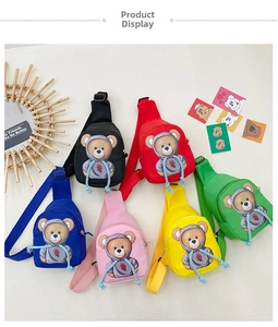 Flat lay of colorful cartoon bear crossbody bags for kids in six vibrant colors