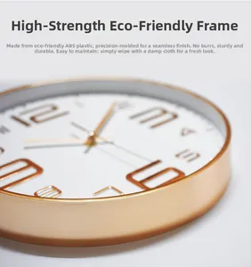 Detailed close-up of 10-inch wall clock with gold 3D numerals and ABS plastic frame