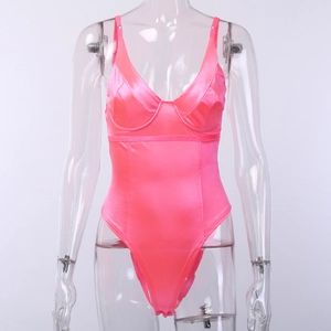Detailed close-up of pink satin bodysuit with camisole straps and cup tailoring