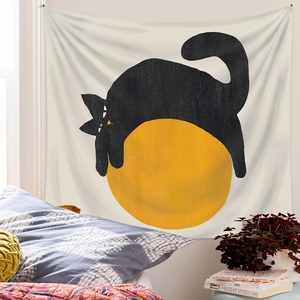 Detail showing minimalist cat art tapestry with yellow ball on light beige fabric