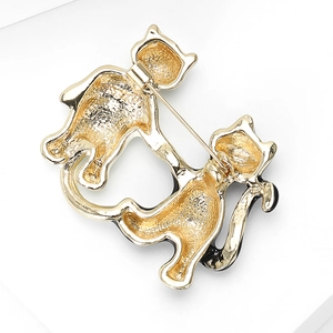 Detailed view of the golden metal alloy cat brooch back showing sturdy pin clasp closure
