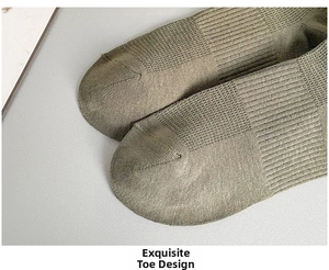 Close-up of seamless toe stitching on breathable olive green cotton mesh socks for men