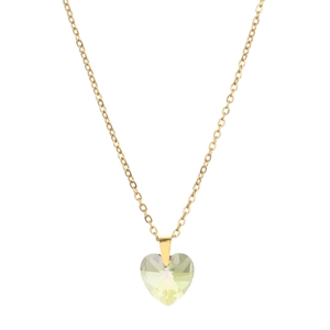 Macro shot of gold-plated chain with a faceted light yellow heart crystal pendant