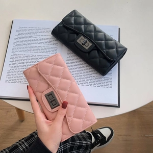 Elegant quilted long wallet for women with classic metal turn-lock closure in black and pink
