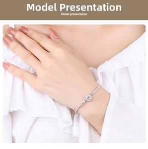 Detailed view of an S925 silver moissanite tennis bracelet worn on a female wrist