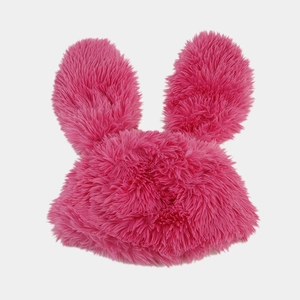 Vibrant pink plush winter trapper hat with long rabbit ears and warm furry texture