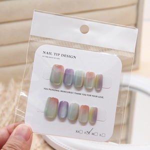 Cat eye nail tips set with gradient smudge effect and glossy cat-eye shimmer